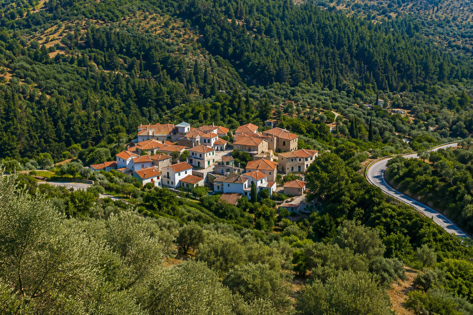 Neochori village in Samos with traditional houses and green rural landscape.