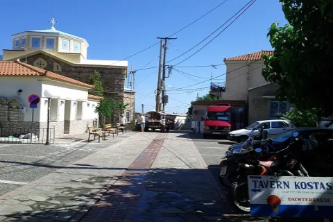 Mountain village of Drakaioi in Samos with stone houses and sea views.